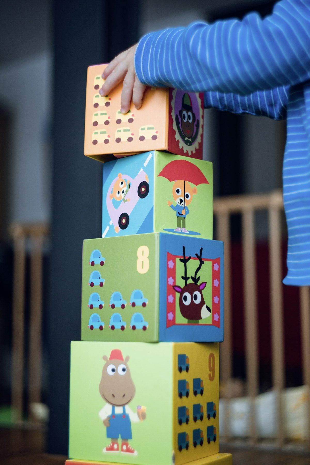 Colourful building blocks on a low shelf