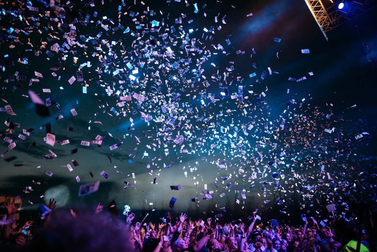 Dramatic stage with blue spotlights and haze at a product launch reveal