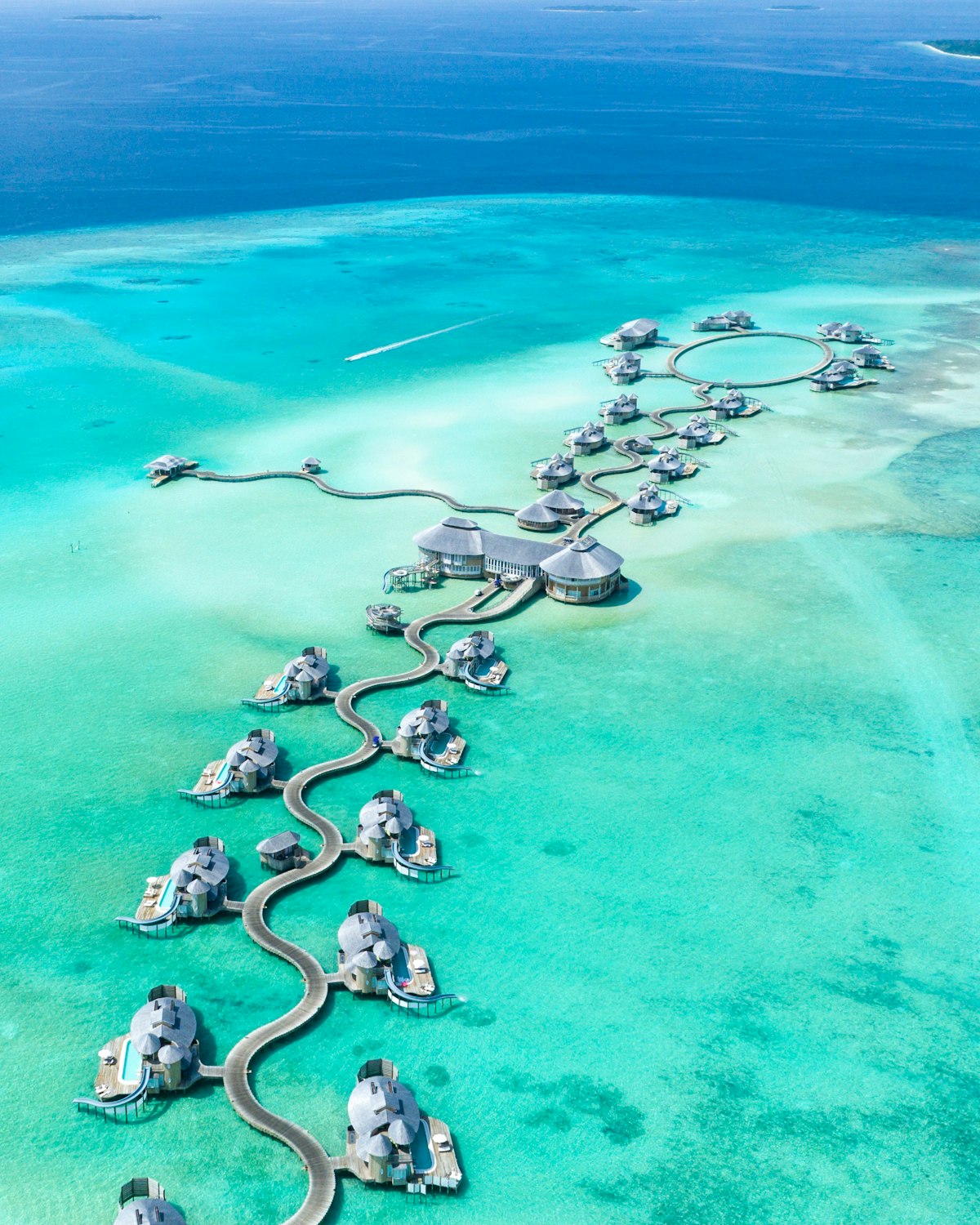 Overwater villas in the Maldives at sunset
