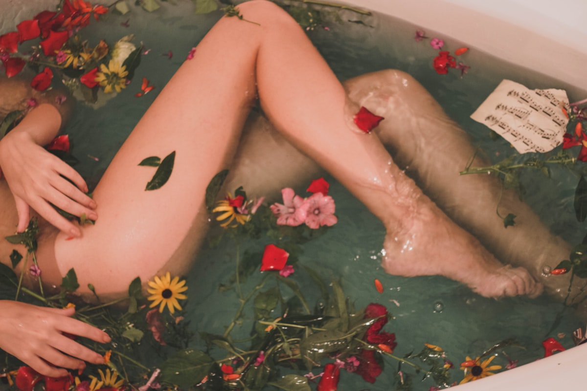 Candle-lit couples suite prepared with rose petals for two