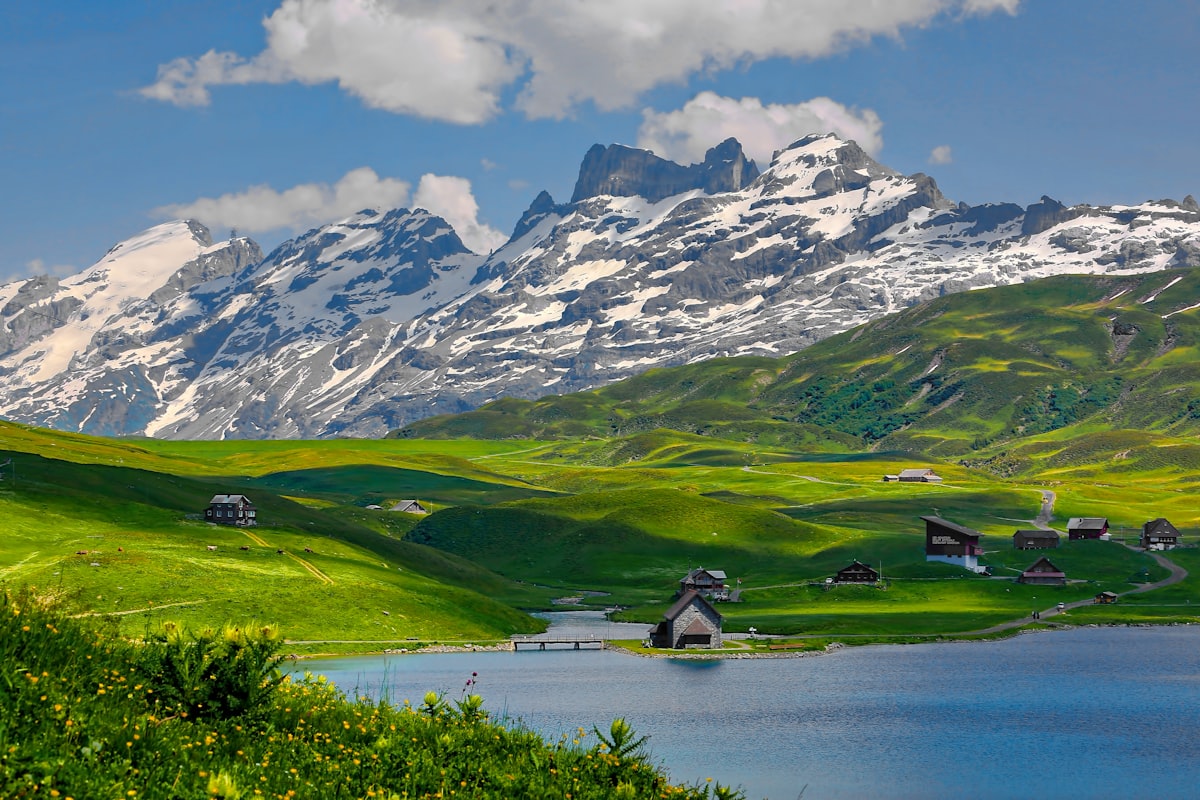 Snow-capped Swiss Alps with a chalet
