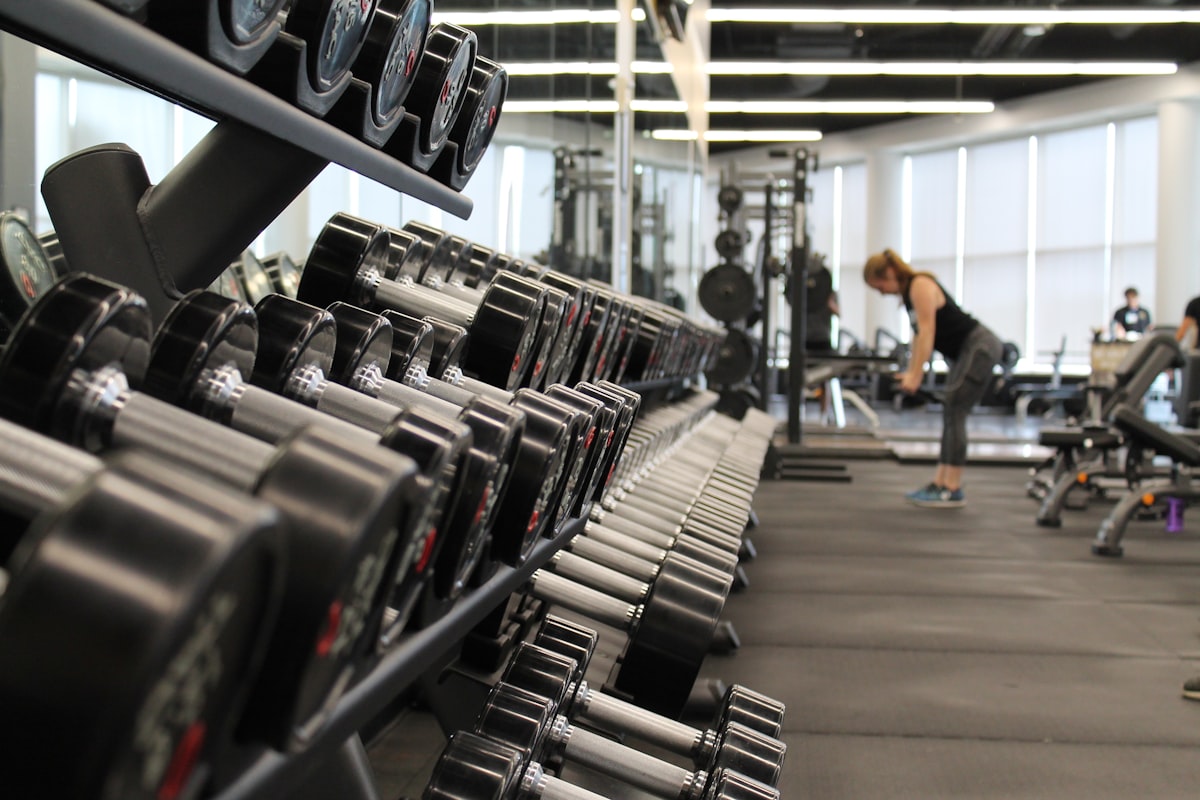Modern fitness center with cardio and weights