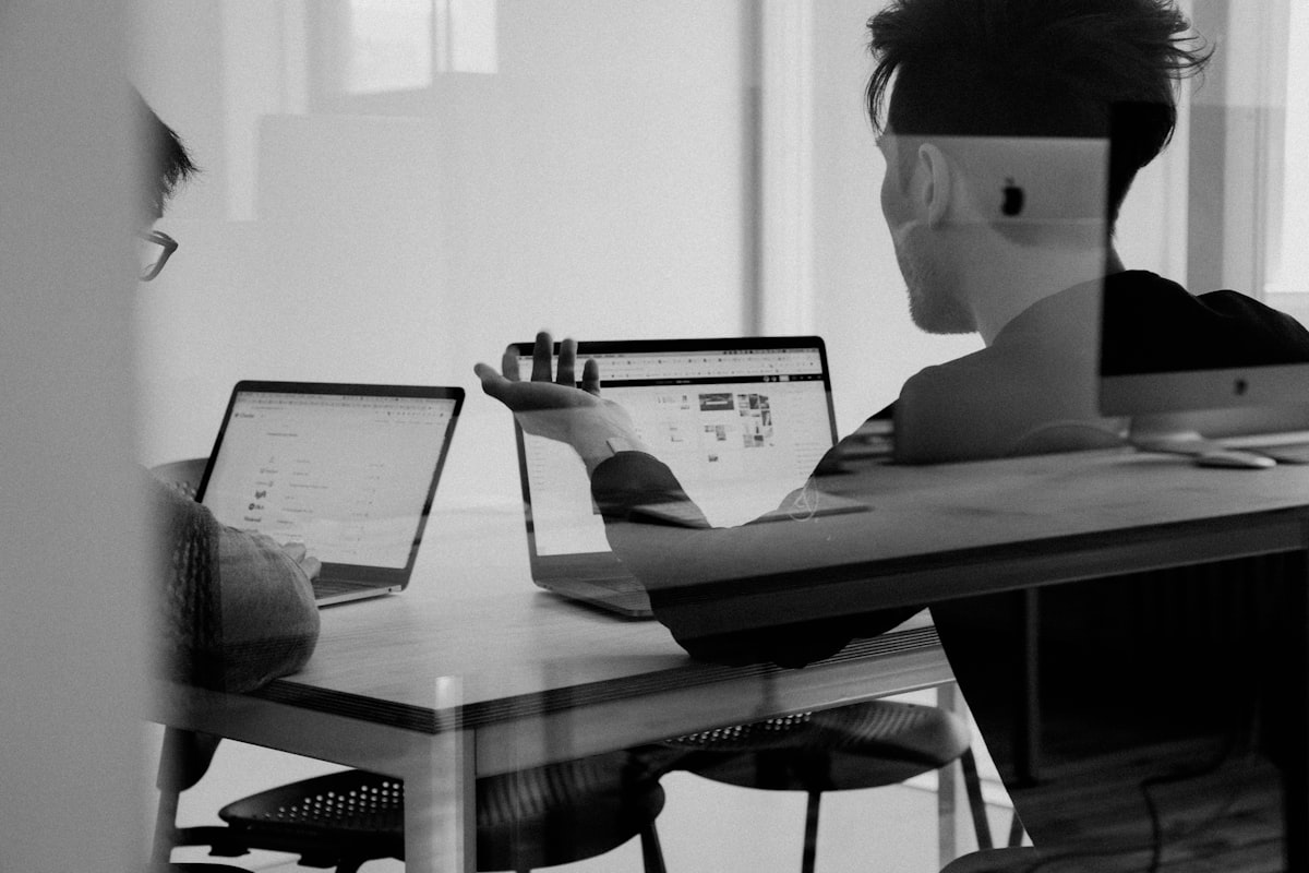 Business meeting reviewing disclosure checklist