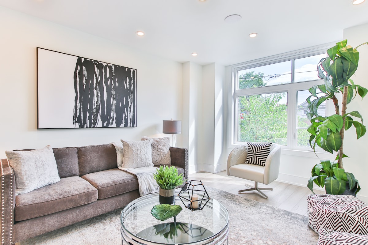 The Limestone Pavilion living room with travertine walls and soft daylight