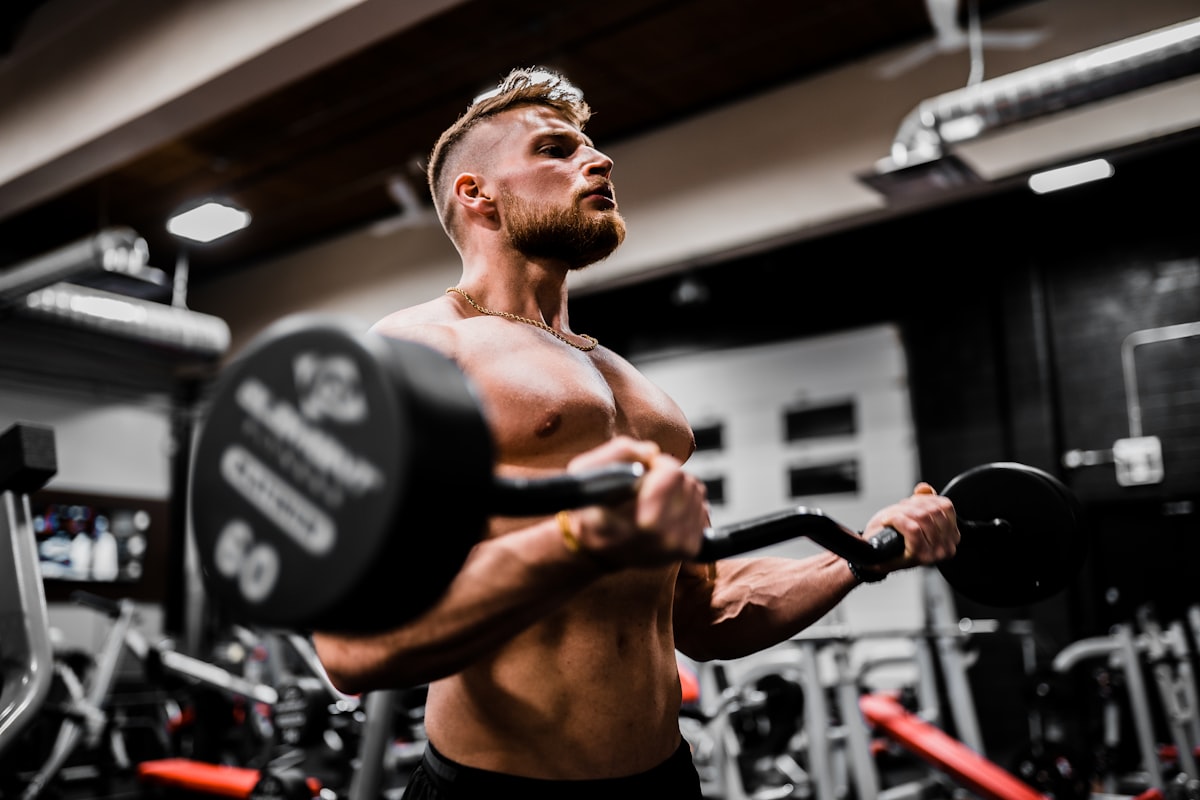Athlete performing barbell deadlift in strength zone